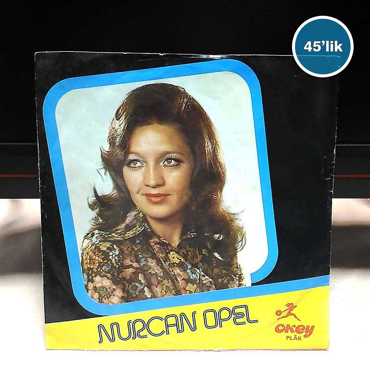 NURCAN OPEL - Bir Yiğit Gurbete Gitse - Ayıramazlar Bizi - 45lik Plak 1 NURCAN OPEL - Bir Yiğit Gurbete Gitse - Ayıramazlar Bizi - 45lik Plak